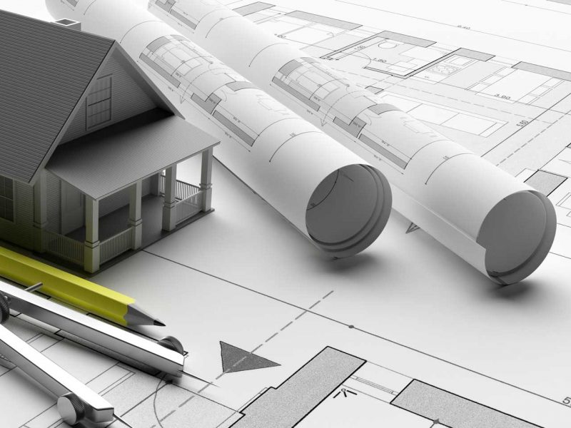 house-model-on-blueprints-background-engineer-cont-BJCJA4X